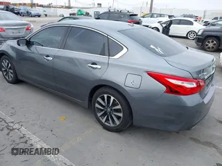 2016 Nissan Altima S z VIN 1N4AL3AP5GC131352, wystawiony jako IAAI lot #42418679 z przebiegiem 106 576 mil mil oraz . Historia ofert i sprzedaży dostępna na DreamBid. Obrazek 3.