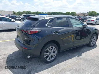 2025 Mazda CX-30 S Preferred with VIN 3MVDMBCM0SM798708, listed as a IAAI auction lot 42133091 with 4,305 mi miles and . Bid and sale history available at DreamBid. Image 4.