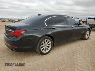 2015 BMW 7 Series 740Li xDrive with VIN WBAYF4C50FGS99289, listed as a Copart auction lot 79809474 with 128,993 mi miles and Salvage Title. Bid and sale history available at carsss.com. Image 3.