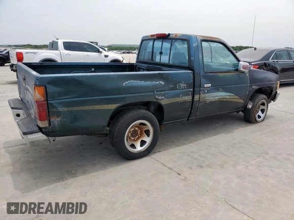 1994 Nissan Frontier with VIN 1N6SD11S2RC341136, listed as a Copart auction lot 57107995 with 174,479 mi miles and Salvage title. Bid and sale history available at DreamBid. Image 3.