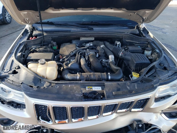 2014 Jeep Grand Cherokee Overland with VIN 1C4RJFCM2EC556953, listed as a Copart auction lot 73046974 with 106,889 mi miles and Salvage Title. Bid and sale history available at carsss.com. Image 11.