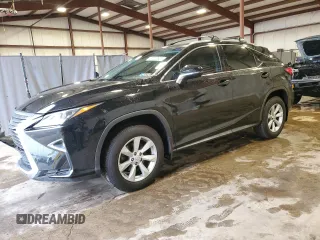 2016 Lexus RX 350 with VIN 2T2BZMCA3GC001679, listed as a Copart auction lot 57070835 with 74,729 mi miles and Salvage Title. Bid and sale history available at DreamBid. Image 1.