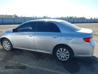 2012 Toyota Corolla L with VIN 2T1BU4EE6CC815435, listed as a IAAI auction lot 41316306 with 122,150 mi miles. Bid and sale history available at carsss.com. Image 14.