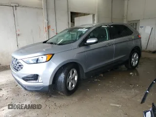 2021 Ford Edge SEL z VIN 2FMPK3J9XMBA07657, wystawiony jako Copart lot #59025605 z przebiegiem 87 848 mil mil oraz Szkoda całkowita • Salvage title. Historia ofert i sprzedaży dostępna na DreamBid. Obrazek 1.
