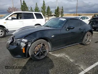 2020 Mazda MX-5 Miata Grand Touring z VIN JM1NDAM75L0411468, wystawiony jako Copart lot #48216305 z przebiegiem 66 016 mil mil oraz Szkoda całkowita • Salvage title. Historia ofert i sprzedaży dostępna na DreamBid. Obrazek 1.