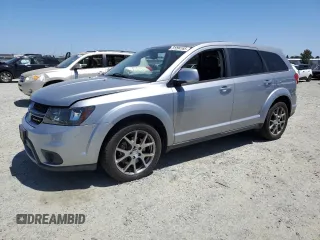 2016 Dodge Journey R/T with VIN 3C4PDCEG6GT198428, listed as a Copart auction lot 61094165 with 97,436 mi miles and Salvage title. Bid and sale history available at DreamBid. Image 1.