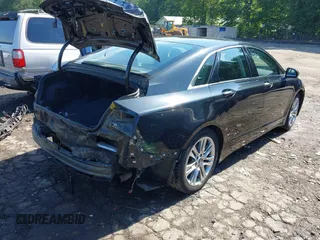 2014 Lincoln MKZ Hybrid with VIN 3LN6L2LU5ER815261, listed as a IAAI auction lot 42224030 with 107,866 mi miles and . Bid and sale history available at DreamBid. Image 4.