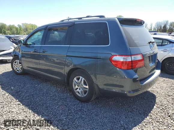 2005 Honda Odyssey EX with VIN 5FNRL38415B009502, listed as a Copart auction lot 53872455 with 205,051 mi miles and Salvage title. Bid and sale history available at DreamBid. Image 2.