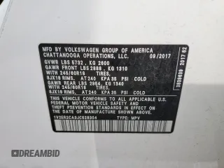 2018 Volkswagen Atlas SEL z VIN 1V2ER2CA3JC528304, wystawiony jako Copart lot #57826315 z przebiegiem 144 665 mil mil oraz Szkody całkowita. Historia ofert i sprzedaży dostępna na DreamBid. Obrazek 13.