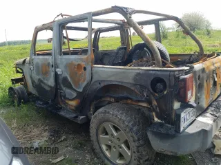 2008 Jeep Wrangler Unlimited X с VIN 1J4GA39128L608115, выставлен на аукционе Copart как лот 58653595 с пробегом Не указан миль и На запчасти • Non repairable. История ставок и продаж доступна на DreamBid. Изображение 2.