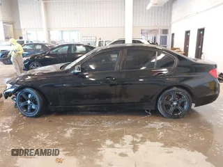 2015 BMW 3 Series 320i xDrive with VIN WBA3C3C56FK203031, listed as a IAAI auction lot 41012182 with 83,611 mi miles and . Bid and sale history available at DreamBid. Image 14.