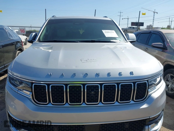 2022 Jeep Wagoneer Series I with VIN 1C4SJVATXNS227350, listed as a IAAI auction lot 42001511 with 70,068 mi miles and . Bid and sale history available at DreamBid. Image 6.