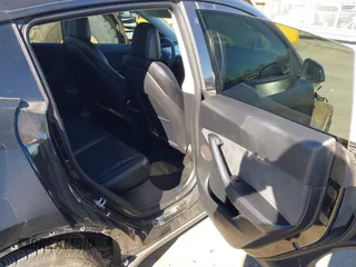 2022 Tesla Model Y Long Range with VIN 7SAYGDEEXNF424856, listed as a IAAI auction lot 41059718 with 44,439 mi miles and . Bid and sale history available at carsss.com. Image 8.