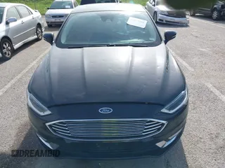 2017 Ford Fusion Titanium with VIN 3FA6P0K91HR257462, listed as a IAAI auction lot 42079361 with 124,914 mi miles and . Bid and sale history available at DreamBid. Image 12.