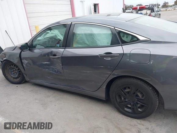 2020 Honda Civic LX with VIN 2HGFC2F63LH530442, listed as a IAAI auction lot 42071650 with 38,520 mi miles and . Bid and sale history available at DreamBid. Image 6.