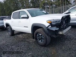 2023 Toyota Tacoma 4WD SR with VIN 3TMCZ5AN2PM641880, listed as a IAAI auction lot 41914417 with 5,128 mi miles. Bid and sale history available at carsss.com. Image 1.