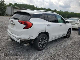 2018 GMC Terrain Denali with VIN 3GKALSEX7JL169745, listed as a Copart auction lot 57286285 with 148,830 mi miles and Salvage title. Bid and sale history available at DreamBid. Image 3.