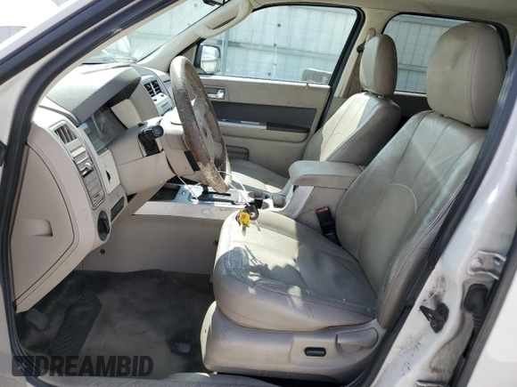 2010 Mercury Mariner with VIN 4M2CN8B78AKJ07854, listed as a Copart auction lot 71726414 with 195,757 mi miles and Non Repairable. Bid and sale history available at carsss.com. Image 7.