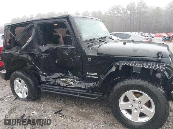 2012 Jeep Wrangler Sport z VIN 1C4AJWAG8CL262755, wystawiony jako IAAI lot #41566823 z przebiegiem 164 135 mil mil oraz . Historia ofert i sprzedaży dostępna na DreamBid. Obrazek 6.