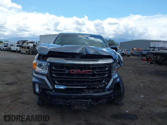 2021 GMC Canyon 4WD AT4 z VIN 1GTG6FEN8M1275345, wystawiony jako IAAI lot #42045878 z przebiegiem 68 299 mil mil oraz . Historia ofert i sprzedaży dostępna na DreamBid. Obrazek 12.
