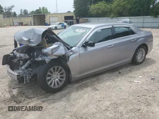2014 Chrysler 300 with VIN 2C3CCAAG2EH336021, listed as a Copart auction lot 57463795 with 118,757 mi miles and Salvage title. Bid and sale history available at DreamBid. Image 1.