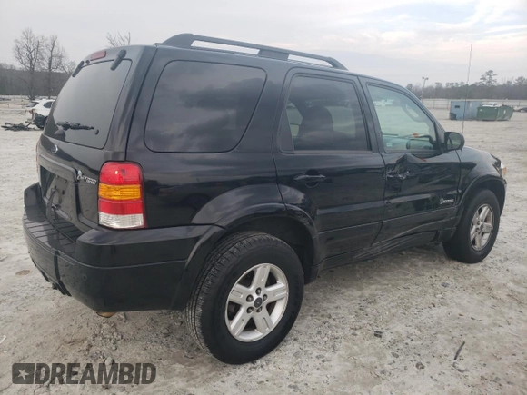 2007 Ford Escape Hybrid with VIN 1FMCU49HX7KB90305, listed as a Copart auction lot 44300405 with 240,011 mi miles and Salvage Title. Bid and sale history available at carsss.com. Image 3.
