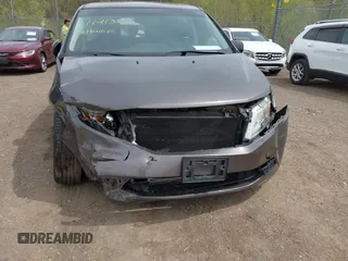 2011 Honda Odyssey EX-L with VIN 5FNRL5H68BB100274, listed as a IAAI auction lot 42159787 with 205,616 mi miles and . Bid and sale history available at carsss.com. Image 6.