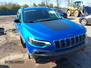 2022 Jeep Cherokee Trailhawk with VIN 1C4PJMBX5ND553336, listed as a IAAI auction lot 41930991 with 40,832 mi miles and . Bid and sale history available at DreamBid. Image 1.