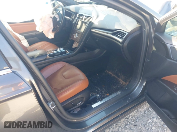 2020 Ford Fusion Titanium with VIN 3FA6P0K91LR175109, listed as a IAAI auction lot 42267532 with 75,000 mi miles and . Bid and sale history available at DreamBid. Image 5.