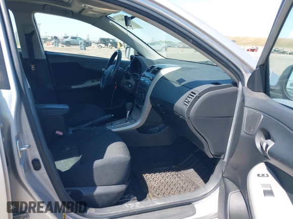 2010 Toyota Corolla with VIN 1NXBU4EE2AZ306390, listed as a IAAI auction lot 42204856 with 178,111 mi miles and . Bid and sale history available at DreamBid. Image 5.