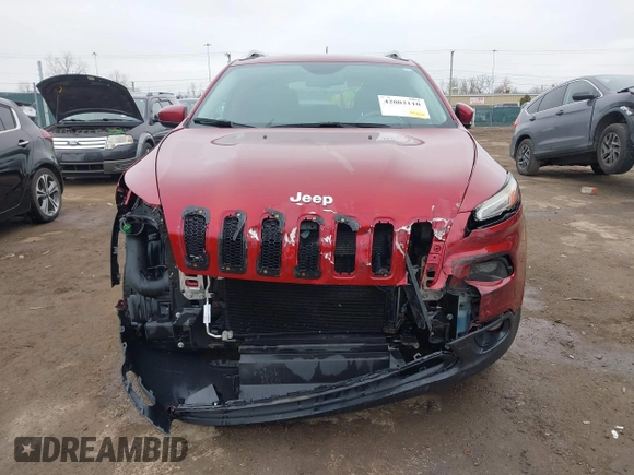 2014 Jeep Cherokee Latitude z VIN 1C4PJMCS4EW127709, wystawiony jako IAAI lot #42002110 z przebiegiem 51 574 mil mil oraz . Historia ofert i sprzedaży dostępna na DreamBid. Obrazek 6.