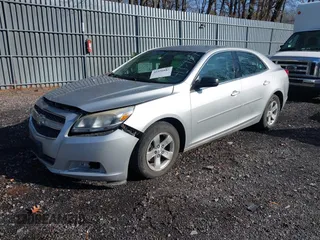 2013 Chevrolet Malibu LS with VIN 1G11B5SA9DU151072, listed as a IAAI auction lot 41939887 with 155,420 mi miles and . Bid and sale history available at DreamBid. Image 2.