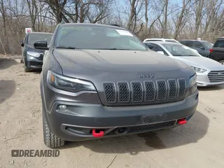 2022 Jeep Cherokee Trailhawk with VIN 1C4PJMBX4ND536592, listed as a IAAI auction lot 41792322 with 43,611 mi miles and . Bid and sale history available at DreamBid. Image 12.