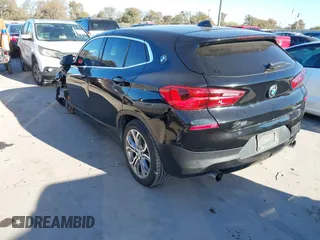2019 BMW X2 sDrive28i with VIN WBXYJ3C50KEP77327, listed as a IAAI auction lot 40922194 with 94,672 mi miles. Bid and sale history available at carsss.com. Image 3.