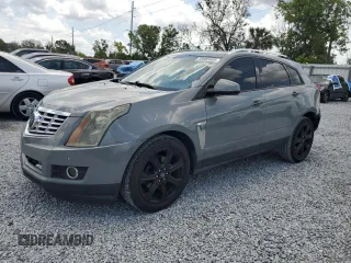 2014 Cadillac SRX Premium Collection z VIN 3GYFNGE30ES627895, wystawiony jako Copart lot #58605985 z przebiegiem 49 300 mil mil oraz Szkody całkowita. Historia ofert i sprzedaży dostępna na DreamBid. Obrazek 1.