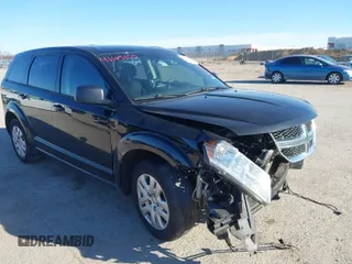 2015 Dodge Journey SE z VIN 3C4PDCAB9FT746883, wystawiony jako IAAI lot #41672904 z przebiegiem 153 077 mil mil oraz . Historia ofert i sprzedaży dostępna na DreamBid. Obrazek 1.