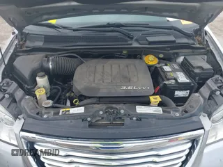 2016 Chrysler Town & Country Touring with VIN 2C4RC1BG0GR213058, listed as a IAAI auction lot 41910462 with 125,013 mi miles and . Bid and sale history available at DreamBid. Image 10.