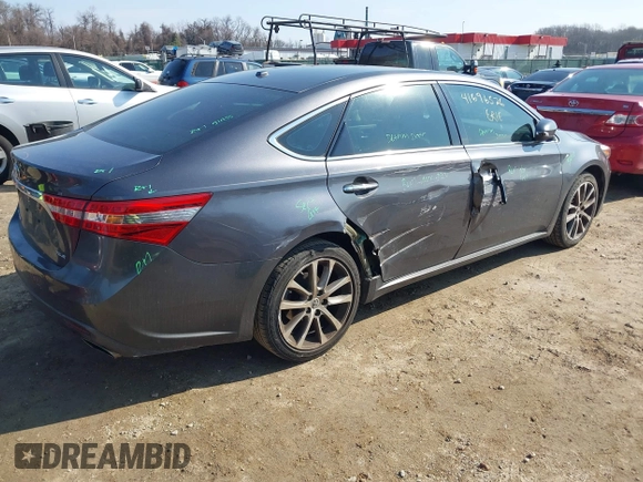 2015 Toyota Avalon Limited with VIN 4T1BK1EB4FU187338, listed as a IAAI auction lot 41696526 with 101,258 mi miles and . Bid and sale history available at DreamBid. Image 4.