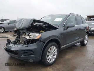 2012 Volkswagen Touareg Sport with VIN WVGEF9BP9CD008545, listed as a IAAI auction lot 41492653 with 138,424 mi miles and . Bid and sale history available at DreamBid. Image 20.