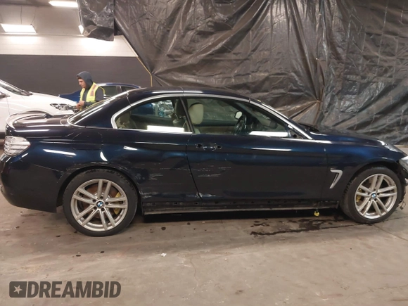 2015 BMW 4 Series 428i xDrive with VIN WBA3T1C59FP820155, listed as a IAAI auction lot 41077810 with 78,029 mi miles and . Bid and sale history available at carsss.com. Image 14.
