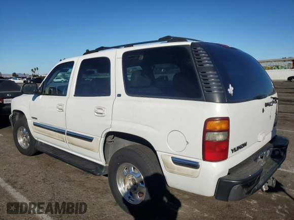 2001 GMC Yukon SLT with VIN 1GKEC13T61R225145, listed as a Copart auction lot 79885564 with 144,846 mi miles and Salvage Title. Bid and sale history available at carsss.com. Image 2.