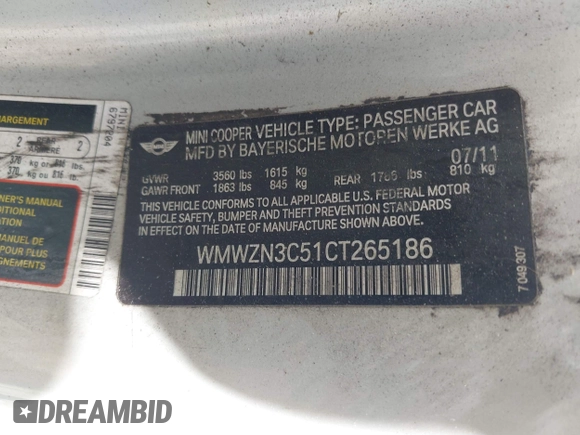 2012 MINI Convertible z VIN WMWZN3C51CT265186, wystawiony jako IAAI lot #42556739 z przebiegiem 118 747 mil mil oraz . Historia ofert i sprzedaży dostępna na DreamBid. Obrazek 9.