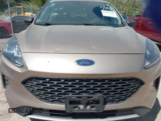 2020 Ford Escape S z VIN 1FMCU9F69LUB90911, wystawiony jako IAAI lot #42223766 z przebiegiem 75 731 mil mil oraz . Historia ofert i sprzedaży dostępna na DreamBid. Obrazek 12.