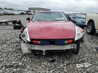 2009 Nissan 370Z z VIN JN1AZ44E19M400603, wystawiony jako Copart lot #79878474 z przebiegiem 129 976 mil mil oraz Szkoda całkowita • Salvage title. Historia ofert i sprzedaży dostępna na DreamBid. Obrazek 5.