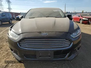 2016 Ford Fusion Titanium with VIN 3FA6P0K98GR319289, listed as a Copart auction lot 77114294 with 123,586 mi miles and Salvage Title. Bid and sale history available at DreamBid. Image 5.