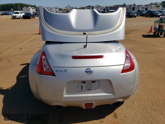 2014 Nissan 370Z Touring with VIN JN1AZ4FH4EM620612, listed as a Copart auction lot 47163375 with 148,458 mi miles and Clean Title. Bid and sale history available at DreamBid. Image 6.