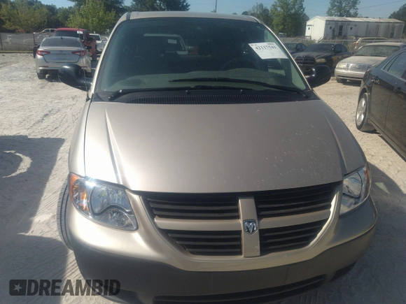 2005 Dodge Caravan SE with VIN 1D4GP25B25B410300, listed as a IAAI auction lot 42117541 with 34,596 mi miles and . Bid and sale history available at DreamBid. Image 6.