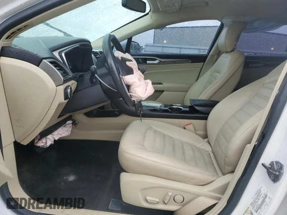 2013 Ford Fusion SE Hybrid with VIN 3FA6P0LU1DR358983, listed as a Copart auction lot 51907665 with 143,459 mi miles and Salvage Title. Bid and sale history available at DreamBid. Image 7.