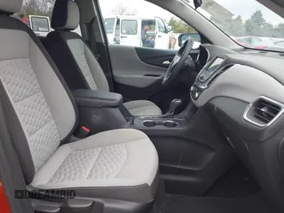 2020 Chevrolet Equinox LS z VIN 2GNAXSEV3L6216007, wystawiony jako IAAI lot #41889041 z przebiegiem 96 406 mil mil oraz . Historia ofert i sprzedaży dostępna na DreamBid. Obrazek 5.