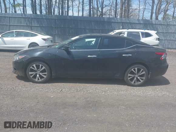 2016 Nissan Maxima 3.5 SV with VIN 1N4AA6AP1GC406660, listed as a IAAI auction lot 42097601 with 267,723 mi miles. Bid and sale history available at carsss.com. Image 14.